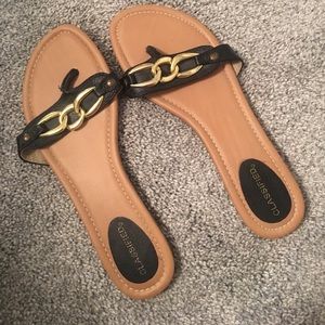 stylish black and gold sandals